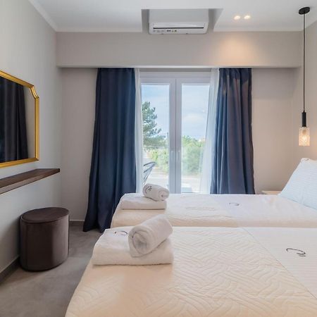 Melena Premium Suites โรดา ภายนอก รูปภาพ
